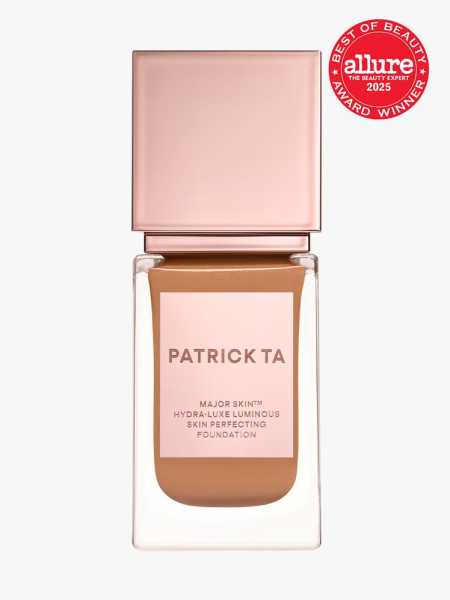 Major Skin Hydra-Luxe Luminous Skin Perfecting Foundation in clear glass bottle with rose gold cap on light gray background with red Allure Best of Beauty seal in the top right corner