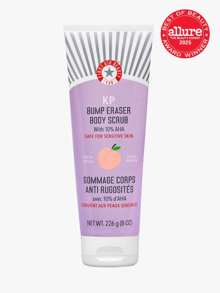 First Aid Beauty KP Bump Eraser Body Scrub with 10% AHA in branded tube on light gray background with red Allure Best of Beauty seal in the top right corner