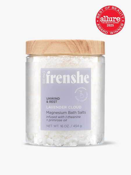 Being Frenshe Magnesium Bath Salts in Lavender Cloud jar of bath salts with purple label and wood cap on light gray background