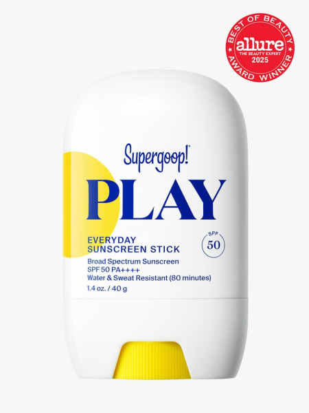 PLAY Everyday Sunscreen Stick SPF 50 in branded white and yellow twist up applicator on light gray background with red Allure Best of Beauty seal in the top right corner