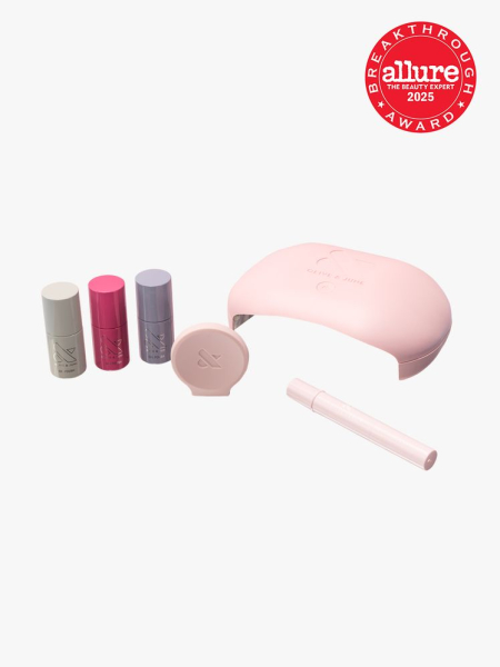 Olive & June Gel Mani System three nail polish bottles and pink gel polish dryer on light gray background with red Allure Best of Beauty seal in the top right corner