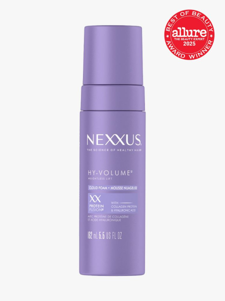 Nexxus Hy Volume Lifting Cloud Foam in branded purple bottle with cap on light gray background with red Allure Best of Beauty seal in the top right corner