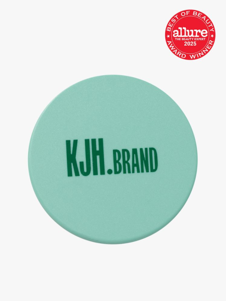 KJH.brand The Hyper Shine Lite Pigment in branded green compact on light gray background with red Allure Best of Beauty seal in the top right corner
