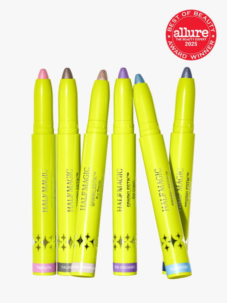 Half Magic Sparklestik Eye Crayons in branded yellow twist up applicators on light gray background with red Allure Best of Beauty seal in the top right corner