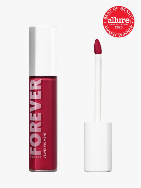 CoverGirl Outlast Forever Velvet Pigment in branded clear bottle with white doe foot applicator cap on light gray background with red Allure Best of Beauty seal in the top right corner