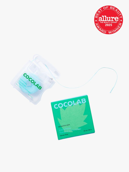 Cocolab Cocofloss in branded mint box packaging next to floss on light gray background with red Allure Best of Beauty seal in the top right corner