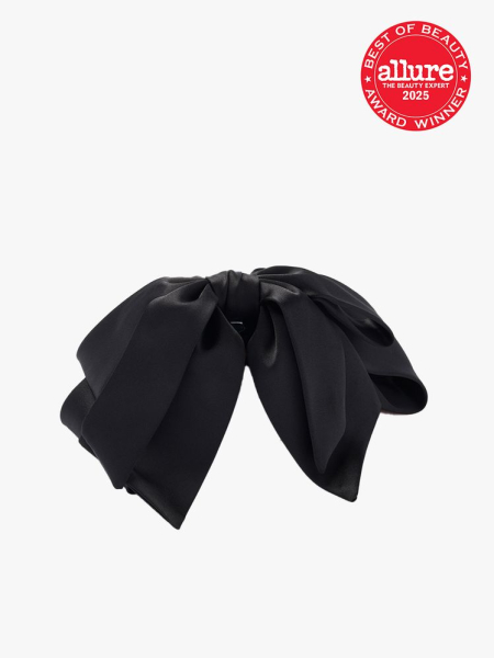 The Hair Edit Old Money Bow black bow hair clip on light gray background with red Allure Best of Beauty seal