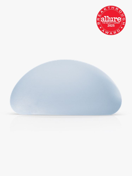 Motiva by Establishment Labs SmoothSilk Round & Ergonomix Implants light blue implant on light gray background with red Allure Best of Beauty seal in the top right corner